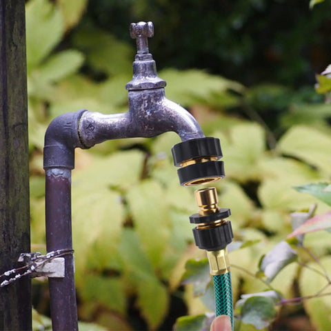 Three Quarter Inch Garden Hose Quick Connectors Kit, Aluminum Male And Female Quick Connect Fittings attached to outdoor faucet.