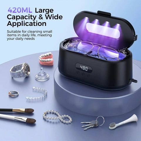 50KHz Ultrasonic Jewelry Cleaner With Dual Modes And LED Display cleaning eyeglasses in black, surrounded by jewelry and dentures