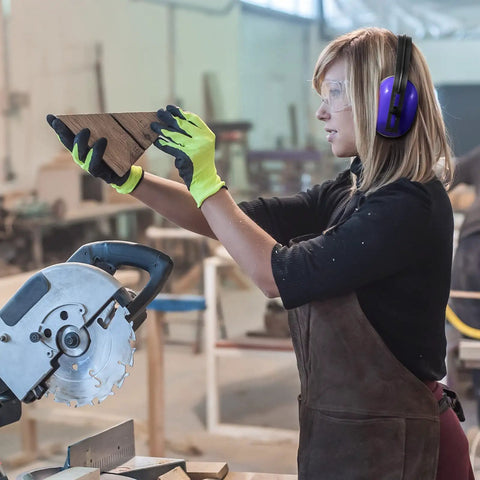 Person wearing Six Pack Adjustable Safety Ear Muffs For Noise Reduction And Hearing Protection All Day Comfort For Hunting Shooting Construction And Woodworking Blue in woodworking shop