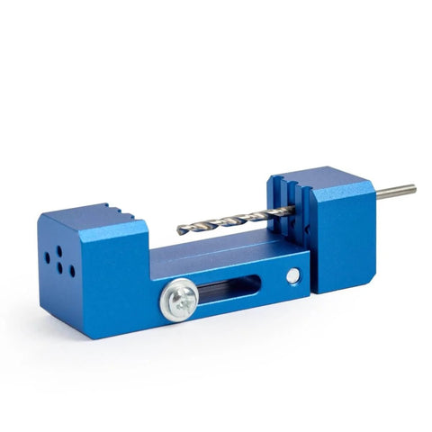 Derby Car Drill Jig For Precise Axle Holes Create Straight Or 2.5 Degree Angled Holes And Raised Wheel Holes To Speed Up Your Pinewood Derby Build, Save Time, And Get A Cleaner, Faster Car On Race Day. Blue aluminum drill jig with drill bit.