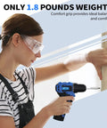 Woman using 12V Cordless Drill Set With Brushless Motor 350 In Lb Torque And 1500 RPM Lightweight Workhorse For DIY Projects Includes Tool Bag 1 Hour Fast Charger And Drill Bits Compact Blue Build For Home Use on wooden surface.