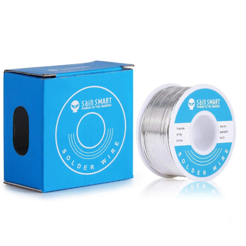 Leaded Solder Wire 0.6mm Sn63Pb37 With Flux Rosin Core For Electronics Soldering 100g Roll beside a blue box