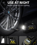 Portable Tire Inflator Air Pump for Cars Trucks SUVs Motorcycles and Bicycles with emergency LED light in use at night