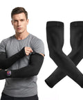 Keep Your Arms Shaded And Locked In With These Adjustable UV Sun Sleeves Featuring A Handy Watch Cutout Thumb Loop And Anti Roll Closure For Effortless Cooling On Every Road Journey on a model in black.