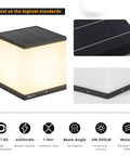 Outdoor Solar Post Cap Light With Warm 3000K LED IP54 Waterproof Energy Saving 9.8 Inches Ideal For Fence Deck Garden Or Patio Posts Modern Luxury Die Cast Stainless Steel No Fuss Install with solar panel top and glowing cube design.