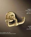 Artifacts Double Robe Hook In Vibrant Brushed Moderne Brass with dimensions, wall mount design and tarnish-resistant finish.