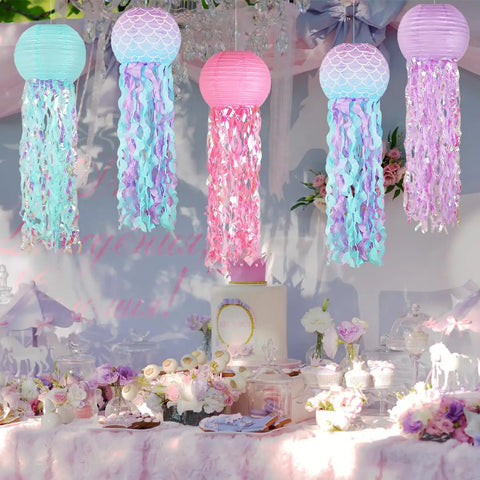 Colorful Jellyfish Paper Lanterns Set Of 6 In Pink Purple And Blue Hanging Lanterns For Mermaid Theme Under The Sea Ocean Birthday Party Decor Totally Vibrant Ocean Life Party Lighting And Backdrop Accents above decorated table.