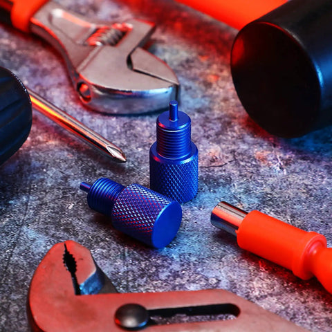 Solid Aluminum Two Piece Brake Proportioning Valve Bleeder Tool Kit For Disc And Drum Systems With Pv2 Pv4 Shuttle Valve Compatibility showing blue metal tools on work surface.