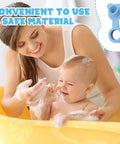 A mother and baby in a yellow bathtub using a 2Pack Silicone Blue Bathtub Stopper Plug during bath time.