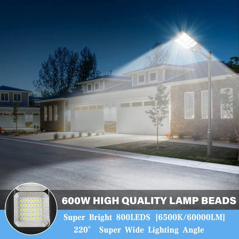 600W Solar Street Light With Motion Sensor Dusk To Dawn 6500K Daylight White illuminating residential driveway at night