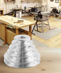 Pagoda Pulley Wheel Set For Benchtop Drill Press With 5 Step Transmission in aluminum, shown on a workbench in a workshop
