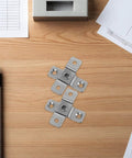 Pair of Heavy Duty Stainless Steel Torque Positioning Damping Door Pivot Hinges on wooden surface
