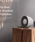 Portable Space Heater With Detachable Hand Warmer, Instant Warmth In Seconds, white heater on wooden table with protection text