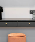 Front view of black desk with Two Dope Gold Cabinet Knobs Hammered Solid Brass Round Drawer Pulls And Handles