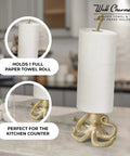 Gold Octopus Paper Towel Holder Made Of Metal Dope Yet Functional Toilet Paper Or Kitchen Paper Roll Stand For Floor Or Countertop Handcrafted 18.6 Inches Tall Decorative Yet Practical Accessory For Bathroom Or Kitchen on a countertop with a roll.