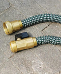 Expandable Hose Repair Kit With Brass GHT Fittings And Ball Valve 0.353 Inch Barb on outdoor pavement