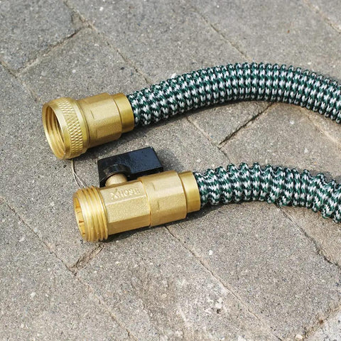 Expandable Hose Repair Kit With Brass GHT Fittings And Ball Valve 0.353 Inch Barb on outdoor pavement