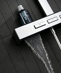 Exposed Shower Faucet System Piano Key Diverter Control Chrome displaying water flow and control buttons on a textured black tile.