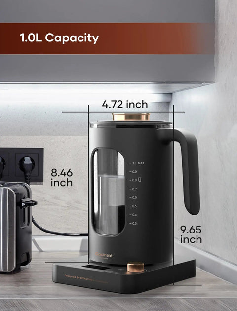Glass Electric Tea Kettle With Tea Infuser And Precise Temperature Knob 1200W Fast Heating BPA Free Easy To Clean 1 Liter Dark Gray Modern Minimalist Design shown in kitchen.