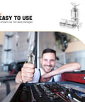 Mechanic holding a Trailer Tailgate Lifting Assist Rollers Kit with Aluminum Alloy Rollers Pins and Washers for easy gate operation