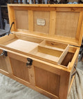 Two Pack Left Side Lid Support Hinges For Wood Boxes And Cabinets, installed on an open wooden chest, showcasing interior compartments.
