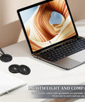 Six Pack Rubber Wire Grommet Kit With Dual Sided Design For Wear Resistant Organized Cable Management And Easy Desk Hole Covers For Home Office Wire Protection And Cord Management. Compact black rubber desk grommets for two cables on a laptop desk