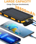 Rugged 38800mAh Solar Power Bank with Type C Output charging three devices simultaneously for camping and travel needs.
