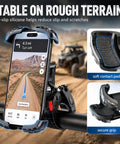Heavy Duty UTV Phone Mount Designed For Gator Xuv845r Models, showing secure anti-slip silicone grip on rough terrain.