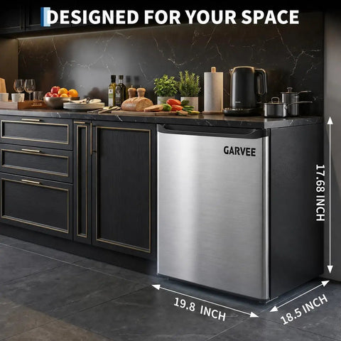One Point One Cubic Foot Upright Freezer With Single Door And Adjustable Shelf In Matte Black, compact design in modern kitchen setting.
