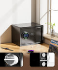 20 Lb Smart Biometric Safe With Fingerprint Lock For Quick No Fuss Access And Real Security on office desk with key and bolts.