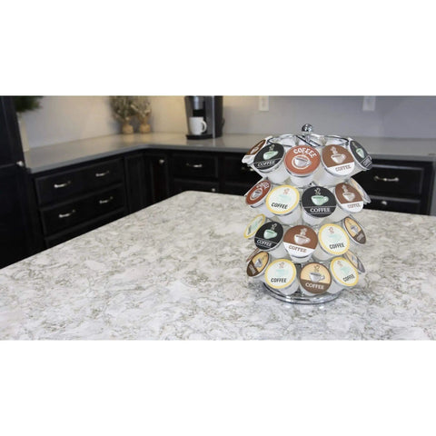 K-Cup Pod Carousel Organizer for Home and Office, Chrome 40-Pod Lazy Susan With 360-Degree Spin, on kitchen countertop.