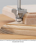 Close-up of Pro Grade Three Flute Carbide Tipped Roundover Router Bit with optional bearing on wooden edge.