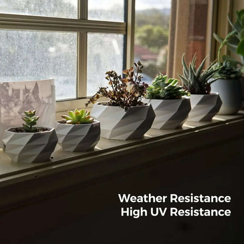 ASA 1.75Mm Black 1 Kg 3D Printer Filament Built For Outdoors With High UV Resistance pots displayed on windowsill with succulents