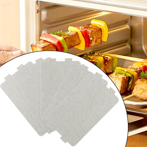 Set Of 5 Microwave Waveguide Cover Plates With Mica Sheets For Home Use shown with skewers in microwave
