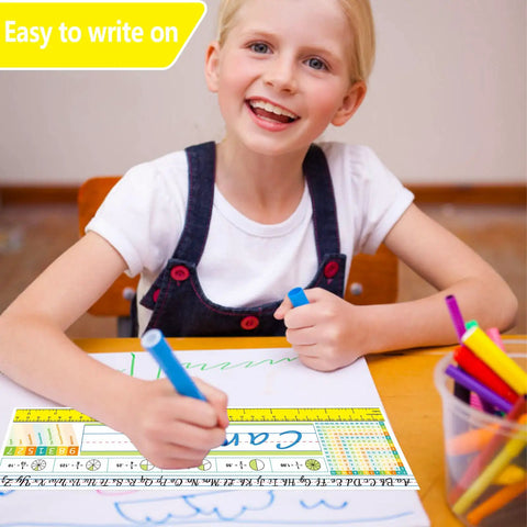 Child writing on paper with Multiplication Desk Reference Name Plates For Students Kid Friendly Self Adhesive Manuscript Tags