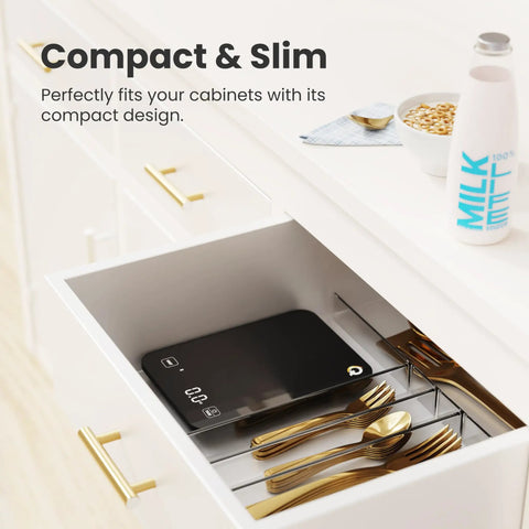 Smart Food Scale With Nutritional Calculator Waterproof LED Display Digital Kitchen Scale stored in drawer next to cutlery