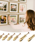 Woman using 60 Pcs Self Drilling Anchors And Screws Kit For Heavy Duty Wall Mounting No Drill Required to hang picture frames