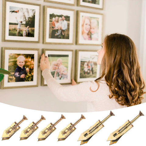 Woman using 60 Pcs Self Drilling Anchors And Screws Kit For Heavy Duty Wall Mounting No Drill Required to hang picture frames