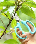Purple Stainless Steel Pruning Shears For Garden Work Ergonomic Handles Lightweight Manual Scissors in use trimming plant