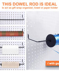 Dowel rod on pegboard for gift wrap, towel, or paper holding, compatible with Pegboard Organizer Kit 18 Pack With Hooks Baskets Cups And Trays For Garage Workshop And Craft Room Universal One Eighth And One Quarter Inch Pegboards
