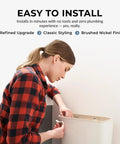 Woman installing Brushed Nickel Front Mount Toilet Handle Replacement Kit on standard toilet tank