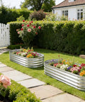 Raised Garden Bed 6 Ft By 2 Ft Metal Elevated Planter Two Pack For Vegetables Flowers And Herbs Galvanized Steel Frame No Cross Rods Needed Durable Outdoor Garden Bed Built To Last in a garden setting with flowers.
