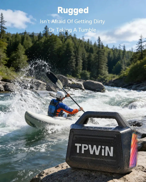 80W Portable Bluetooth Speaker With Big Bass And Rugged Outdoor Vibe, IPX6 Waterproof, on a rock by a river, kayak in background