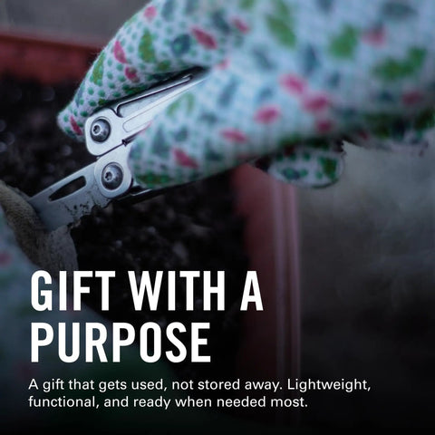 Wingman Multitool With Spring Action Pliers And Scissors Stainless Steel 14 Tools In One in hand with gloves gardening