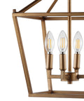 Close-up of antique gold 4 light pendant ceiling fixture with caged lantern design and LED bulbs for dining room.