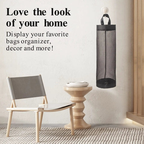 Hanging Mesh Bag Holder Dispenser For Plastic Grocery Bags displayed in a room with chair and table, Black, Space Saving Organizer.