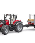 Massey Ferguson 7480 Tractor With Detachable Front Loader And Timber Trailer Set showing the full length with off road capability