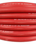 Badass 50 Foot Red Rubber Air Hose Delivers Knockout Durability and Sweet Flex for Your Shop with markings on coiled rubber hose.