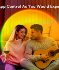 Couple enjoying Dope Glow LED Light Projector For Aesthetic Room Vibe, RGB Color Changing Night Light in cozy setting.