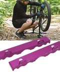 Two Pack Bike Fork Vise Clamp And Axle Spindle Repair Tool Set for Front Fork Hub And Rear Shock Maintenance shown outdoors